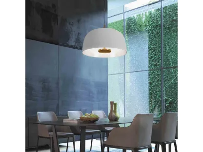 Lampada a sospensione in metacrilato con sorgente luminosa collocata all'interno di un disco metallico Artù di Status