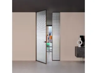 Porta per interni a filo muro Sherazade Double Swing in vetro con elaio in alluminio Plain di Glas Italia