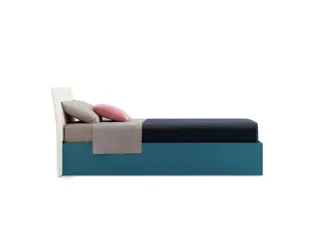 Letto singolo Flare con testiera in tessuto e box contenitore di Nidi